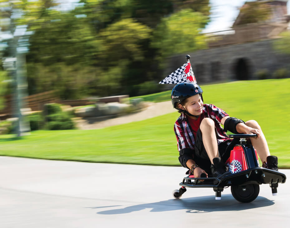 kid riding Razor Crazy Cart electric go cart
